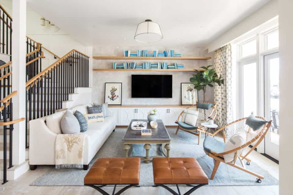 Brightly lit, cottage living area with classic, contemporary décor and beach themed accents