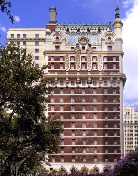 Exterior view of The Adolphus Hotel with unique architecture in Downtown Dallas